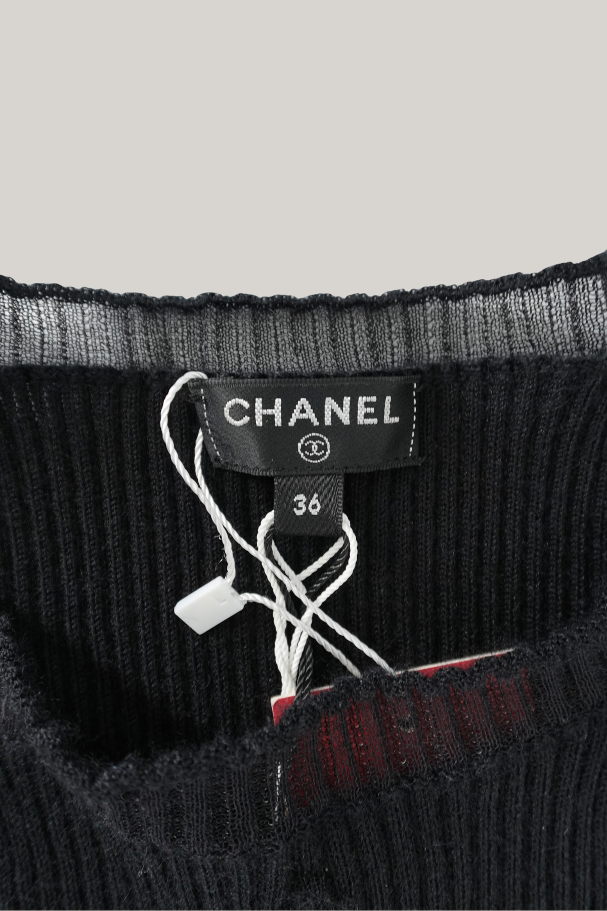 2021 Chanel Black Ribbed Knit Ruffle Dress (FR 36)